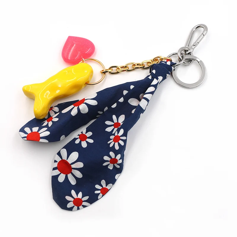 Daisy και Fish Keychain